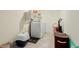 Laundry room featuring a full size washer and dryer unit, and a cat box at 25913 W Cat Balue Dr, Buckeye, AZ 85396