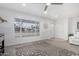 Inviting living room with large window, neutral tones, and comfortable seating at 263 W 9Th S Pl, Mesa, AZ 85201