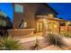 Backyard featuring an outdoor bar with a built-in grill and a covered patio, great for hosting parties at 26711 N 21St Dr, Phoenix, AZ 85085