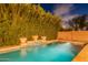 Relax in the luxurious private pool with soothing water feature, surrounded by lush landscaping for ultimate privacy at 26711 N 21St Dr, Phoenix, AZ 85085