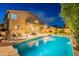 A private backyard oasis with a pool, patio, and lush landscaping awaits at 26711 N 21St Dr, Phoenix, AZ 85085