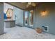 Patio with stylish doors and a built-in bar area offers seamless indoor-outdoor living at 26711 N 21St Dr, Phoenix, AZ 85085
