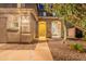 A welcoming front entrance with stone accents and well-maintained desert landscaping at 26711 N 21St Dr, Phoenix, AZ 85085