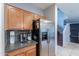 Stylish kitchen showcases stainless steel appliances, ample counter space, and generous storage cabinets at 26711 N 21St Dr, Phoenix, AZ 85085