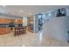 Spacious kitchen featuring wood cabinets, stainless appliances, an island with seating, and an open layout at 26711 N 21St Dr, Phoenix, AZ 85085
