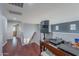 Spacious loft area with hardwood floors and natural light, perfect for entertaining and activities at 26711 N 21St Dr, Phoenix, AZ 85085
