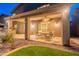 Covered patio with ceiling fans, lighting, and outdoor seating area, perfect for entertaining at 26711 N 21St Dr, Phoenix, AZ 85085