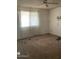 Bedroom featuring a ceiling fan, one window and a light at 2934 W Hartford Dr, Phoenix, AZ 85053