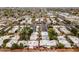 A stunning aerial view of a charming neighborhood featuring well-maintained homes and lush, mature trees at 3002 N 32Nd St # 15, Phoenix, AZ 85018