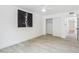 Minimal bedroom with light wood-look floors, white walls, and large closet at 3002 N 32Nd St # 15, Phoenix, AZ 85018