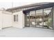 Private patio with white brick and access to living area, and separate smaller window at 3002 N 32Nd St # 15, Phoenix, AZ 85018