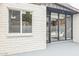 Private patio with white brick and access to living area, and separate smaller window at 3002 N 32Nd St # 15, Phoenix, AZ 85018