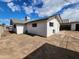 View of the backyard with a fenced-in perimeter, providing privacy and security for outdoor activities at 3123 W Holly St, Phoenix, AZ 85009