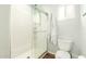 Bathroom featuring a glass-enclosed shower, modern toilet, and neutral wall color at 3512 N Chambers Ct, Scottsdale, AZ 85251