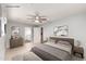 Serene bedroom with a ceiling fan and ensuite bathroom, offering a private retreat at 3512 N Chambers Ct, Scottsdale, AZ 85251