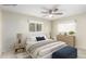 Spacious bedroom with stylish décor, soft textures, and a comfortable seating area at 3512 N Chambers Ct, Scottsdale, AZ 85251