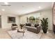 Bright living room featuring a large window offering ample natural light and stylish furnishings at 3512 N Chambers Ct, Scottsdale, AZ 85251