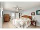 Main bedroom with neutral walls, tile floors, and an ensuite bathroom at 3512 N Chambers Ct, Scottsdale, AZ 85251