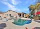 Beautiful backyard featuring a pool and covered patio at 4215 W Reddie Loop, Phoenix, AZ 85083