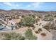 Backyard showcasing a pool, desert landscaping, a covered patio, and a sense of privacy at 4215 W Reddie Loop, Phoenix, AZ 85083