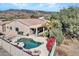 Secluded backyard featuring a private pool, desert landscaping, a covered patio with a grill, and mountain views at 4215 W Reddie Loop, Phoenix, AZ 85083