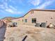 Gravel backyard showing the side of the home with a boat and A/C units at 4215 W Reddie Loop, Phoenix, AZ 85083