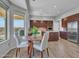 Eat-in kitchen features stainless appliances, wood floors and a bay window view at 4215 W Reddie Loop, Phoenix, AZ 85083