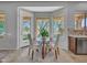 Cozy breakfast nook with views of the backyard and easy access to outdoor seating at 4215 W Reddie Loop, Phoenix, AZ 85083