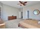 Large primary bedroom featuring neutral walls, ceiling fan, and a minimalistic style at 4215 W Reddie Loop, Phoenix, AZ 85083