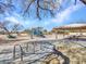 Community playground featuring play equipment, swings, covered picnic area, and a bike rack for recreational enjoyment at 4215 W Reddie Loop, Phoenix, AZ 85083