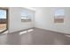 Bright bedroom with tile flooring, neutral walls, and multiple windows for natural light at 4351 W Jeanette Ln, San Tan Valley, AZ 85144