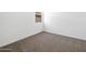 Neutral bedroom featuring carpeted floors and white walls at 4351 W Jeanette Ln, San Tan Valley, AZ 85144