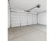 Spacious garage with an automatic door opener and a concrete floor at 4351 W Jeanette Ln, San Tan Valley, AZ 85144