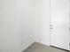 Hallway with hard surface floor and a white door at 4351 W Jeanette Ln, San Tan Valley, AZ 85144