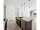 Kitchen has granite countertops, stainless steel appliances, and a large island at 4351 W Jeanette Ln, San Tan Valley, AZ 85144