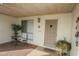 Welcoming front porch with a decorative door, cozy seating, and ample natural light at 4434 W Dahlia Dr, Glendale, AZ 85304