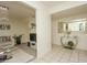 Open-concept living area with modern decor, stylish furnishings, and lots of natural light at 4434 W Dahlia Dr, Glendale, AZ 85304