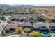 Expansive aerial view of a residential neighborhood, showcasing the community layout and mountain views at 4624 W Heyerdahl Ct, New River, AZ 85087