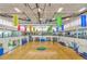 Bright and spacious gymnasium with basketball court and fitness equipment at 4624 W Heyerdahl Ct, New River, AZ 85087