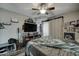 This bedroom is well-lit with a ceiling fan and has wood-look laminate flooring at 5213 S Monaco Dr, Tempe, AZ 85283