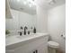 Bathroom with a white vanity, modern fixtures, and a white toilet at 5246 E Enrose St, Mesa, AZ 85205