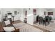 Bright living room features an open floor plan, modern decor, and comfortable furnishings at 5725 E Colby St, Mesa, AZ 85205
