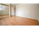 Spacious bedroom featuring a large mirrored closet and light wood-look flooring throughout at 6020 E Shea Blvd, Scottsdale, AZ 85254