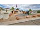 Charming single-story home with desert landscaping, statues, and well-maintained exterior at 6020 E Shea Blvd, Scottsdale, AZ 85254
