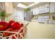Bright kitchen with stainless steel appliances, skylight, and lots of counter space at 6020 E Shea Blvd, Scottsdale, AZ 85254