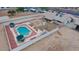 Aerial view of a private pool with lounge chairs in a fenced backyard oasis at 6020 E Shea Blvd, Scottsdale, AZ 85254