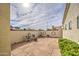 Private backyard patio features tile, a fountain, and chairs at 6614 E Portia St, Mesa, AZ 85215