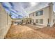 Beautiful backyard featuring a pool, mature landscaping, and covered patio at 6614 E Portia St, Mesa, AZ 85215