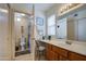 Functional bathroom with a well-lit vanity area and a separate toilet room offering privacy at 6614 E Portia St, Mesa, AZ 85215