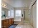 Bright bathroom with double vanity, separate shower, soaking tub, and plenty of natural light at 6614 E Portia St, Mesa, AZ 85215